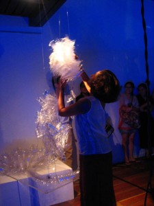 Anne James with Lisa Foo's Lancelets, a headgear and selendang made out of recycled PET bottles with battery operated LEDs
