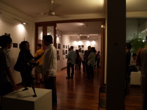 Raja Shahriman's sculpture and visitors crowding around Tara's little room of portraits